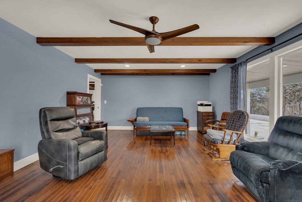 2165 Ben Mason Road Cookeville, TN 38506 - Photo 15 of 52 a living room with furniture and a wooden floor