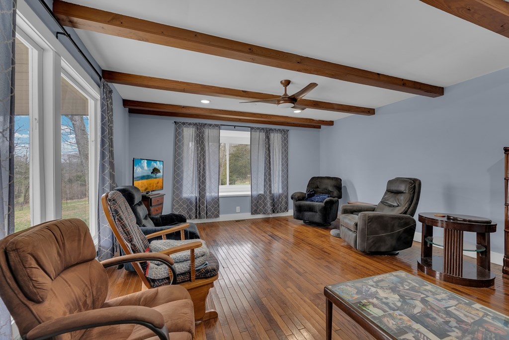 2165 Ben Mason Road Cookeville, TN 38506 - Photo 16 of 52 a living room with furniture and a flat screen tv