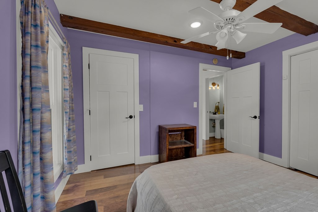 2165 Ben Mason Road Cookeville, TN 38506 - Photo 20 of 52 a spacious bedroom with a bed and a fireplace