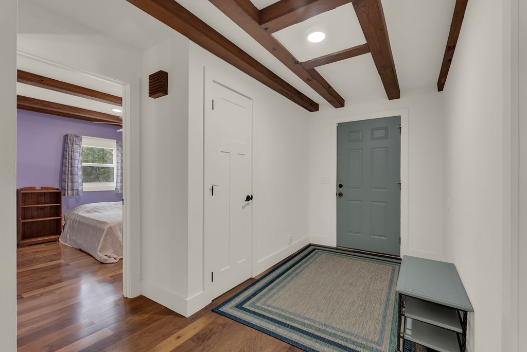 2165 Ben Mason Road Cookeville, TN 38506 - Photo 21 of 52 a view of a hallway with wooden floor and cabinet
