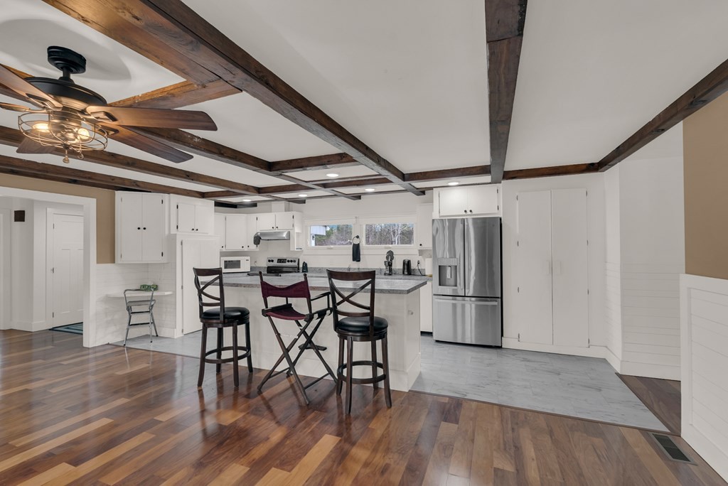 2165 Ben Mason Road Cookeville, TN 38506 - Photo 7 of 52 a dining room with furniture and wooden floor