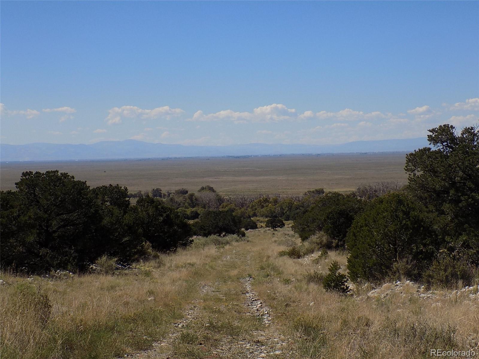 Little Bear Road Mosca, CO 81146 - Photo 16 of 22 a view of city and mountain