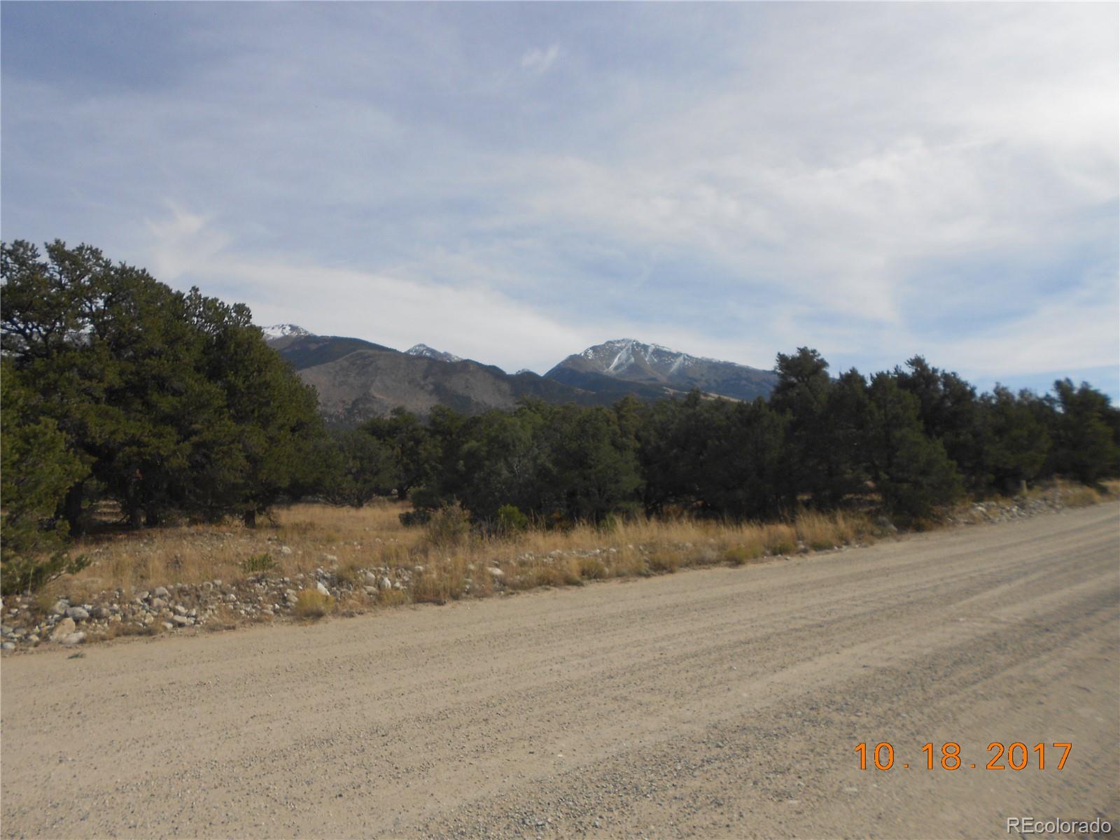 Little Bear Road Mosca, CO 81146 - Photo 17 of 22 a view of a dry yard with mountain