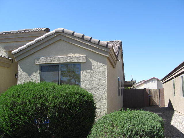 8614 West Riley Road Tolleson, AZ 85353 - Photo 3 of 30 East side view from front