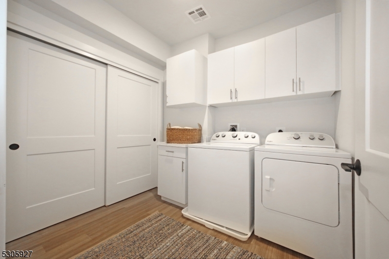 30 Court Street Morristown, NJ 07960 - Photo 11 of 27 a utility room with dryer and washer