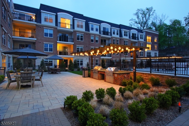 30 Court Street Morristown, NJ 07960 - Photo 26 of 27 a view of a chairs and table in the patio in front of building