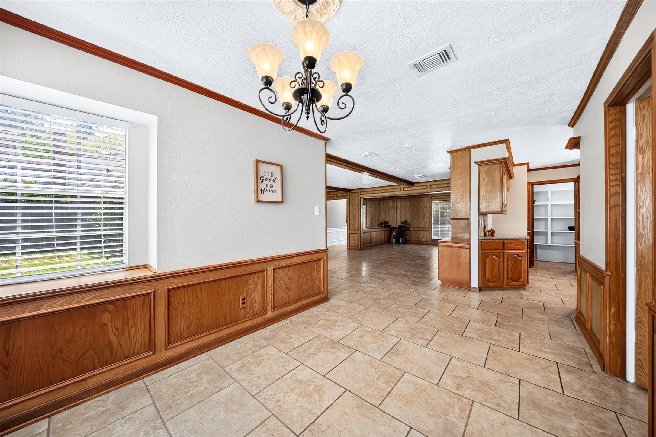 6507 Spring Leaf Drive Spring, TX 77379 - Photo 15 of 50 View from the breakfast area showcasing the open-concept layout, seamlessly connecting the kitchen and spacious room-ideal for everyday living and entertaining.
