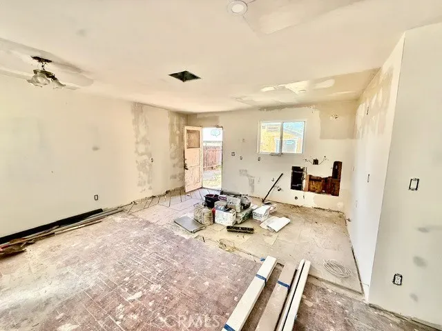 a view of a living room and a window