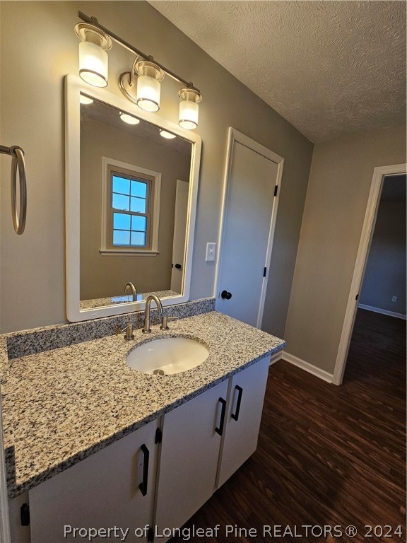 3458 Popes Crossing Road Lumberton, NC 28358 - Photo 29 of 50 a bathroom with a granite countertop sink and a mirror