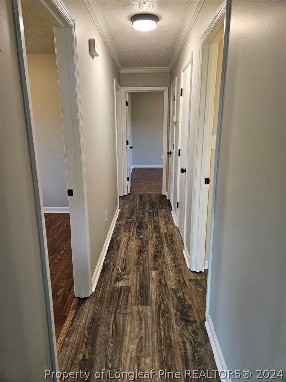 3458 Popes Crossing Road Lumberton, NC 28358 - Photo 32 of 50 a view of a hallway with wooden floor and staircase