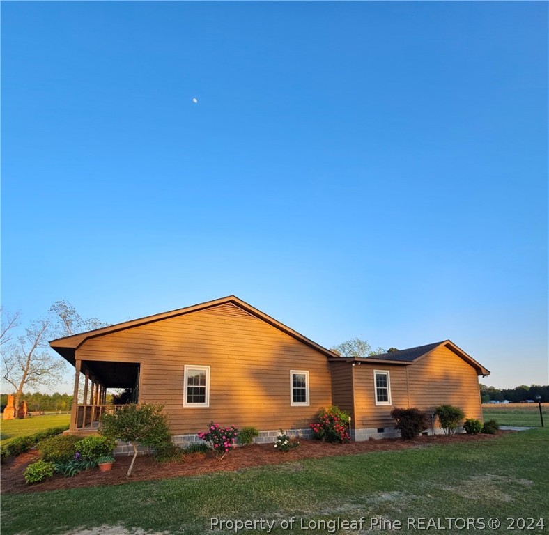 3458 Popes Crossing Road Lumberton, NC 28358 - Photo 6 of 50 a view of house with backyard