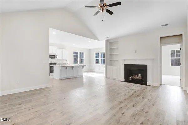 an empty room with closet area