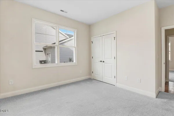 a spacious bathroom with a double vanity sink mirror and