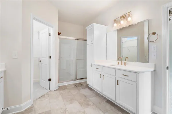 a view of swimming pool with lounge chair