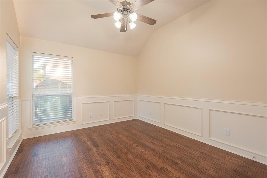 1404 Rio Grande Drive Allen, TX 75013 - Photo 20 of 40 wooden floor in an empty room with a window