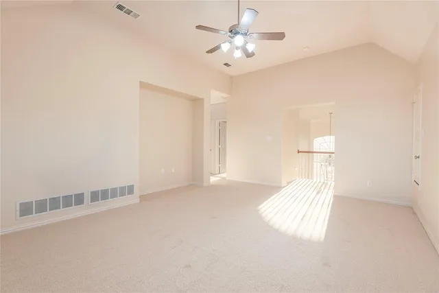 a spacious bathroom with a bathtub shower sink vanity and mirror