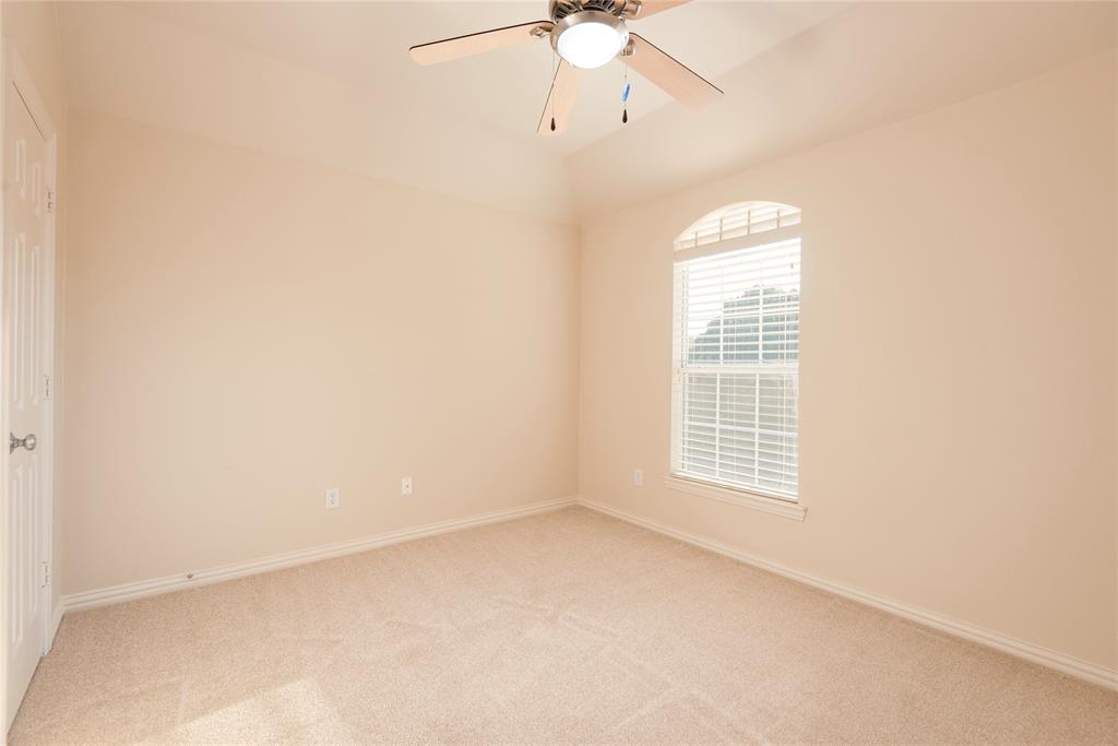 1404 Rio Grande Drive Allen, TX 75013 - Photo 27 of 40 a view of an empty room with a window