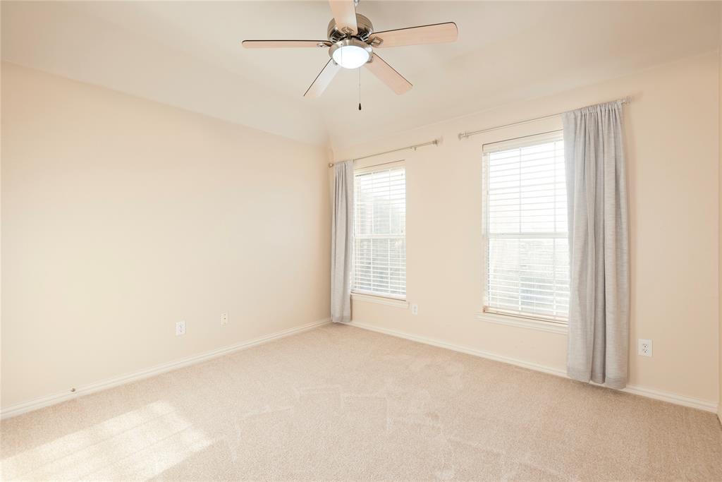 1404 Rio Grande Drive Allen, TX 75013 - Photo 29 of 40 a view of an empty room with a window