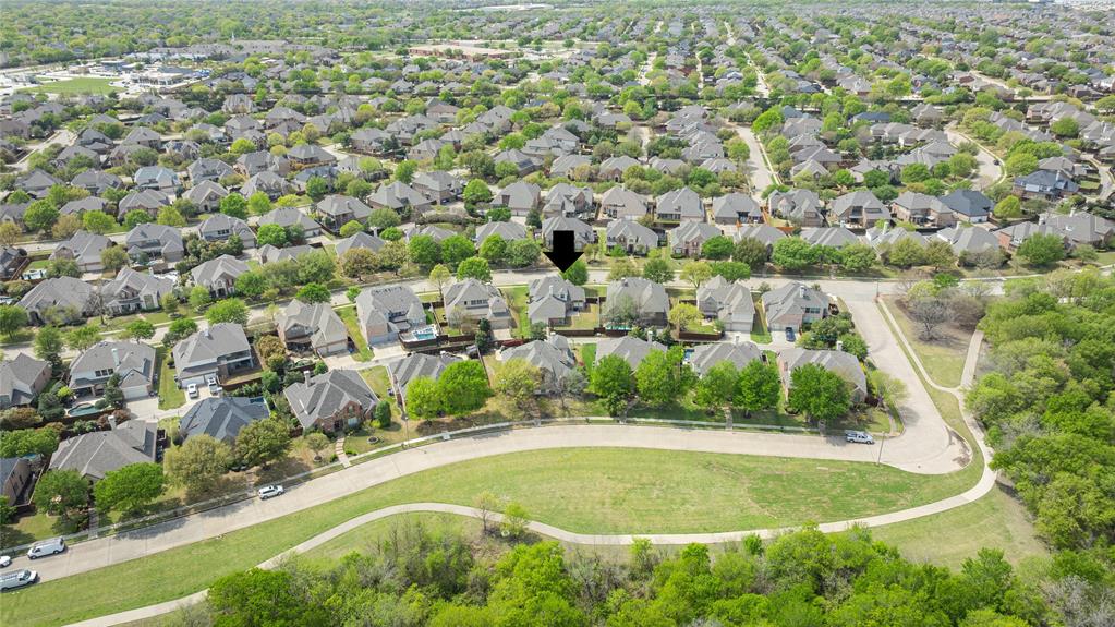 1404 Rio Grande Drive Allen, TX 75013 - Photo 33 of 40 an aerial view of residential houses with outdoor space and trees all around