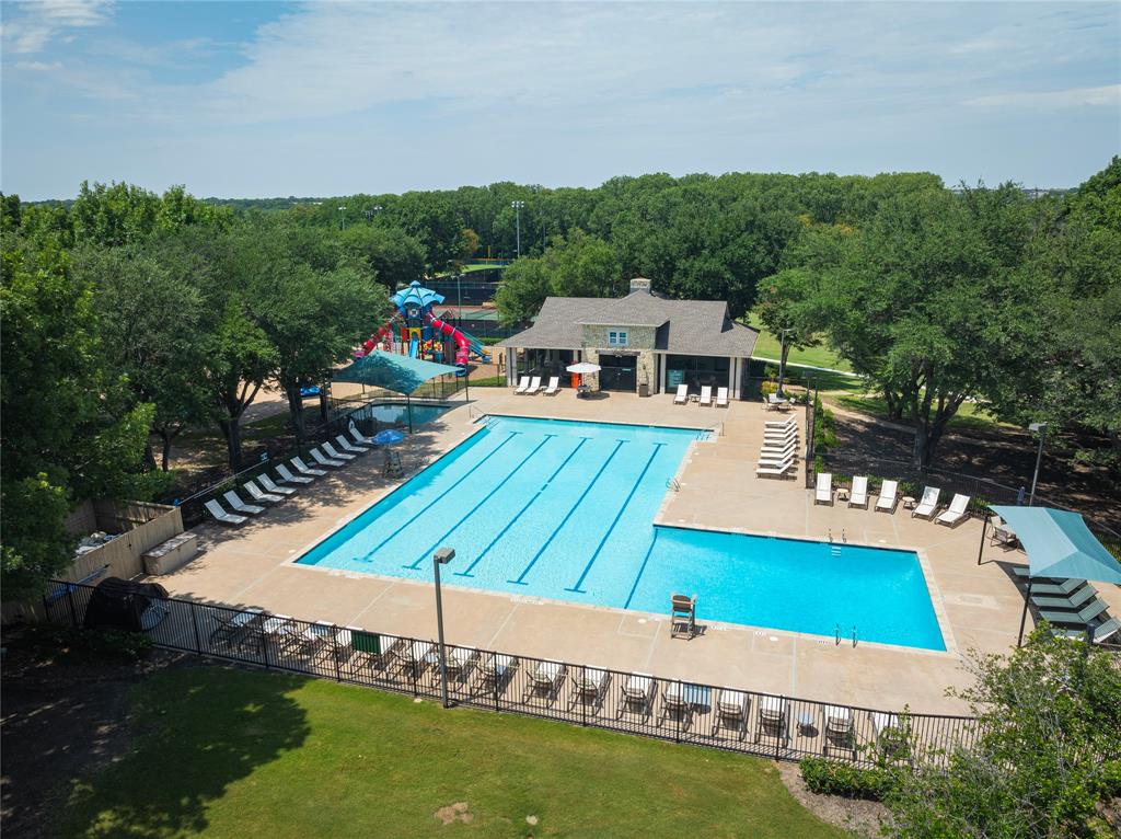 1404 Rio Grande Drive Allen, TX 75013 - Photo 36 of 40 an aerial view of a house with a garden and swimming pool