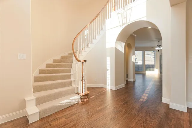 a view of entryway with wooden floor