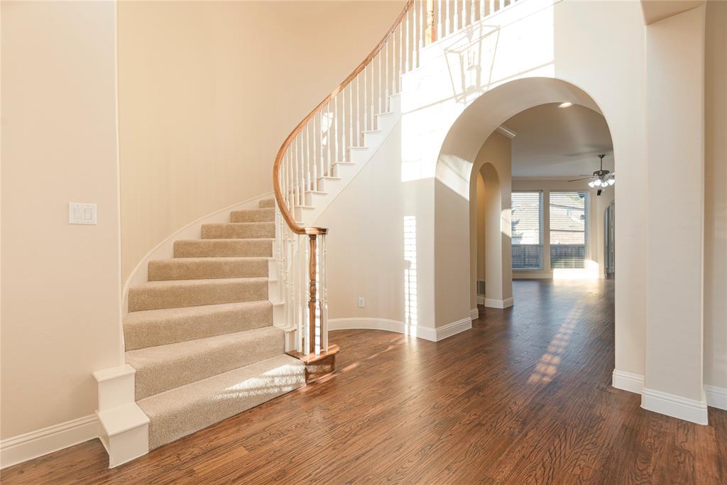 1404 Rio Grande Drive Allen, TX 75013 - Photo 7 of 40 a view of entryway with wooden floor
