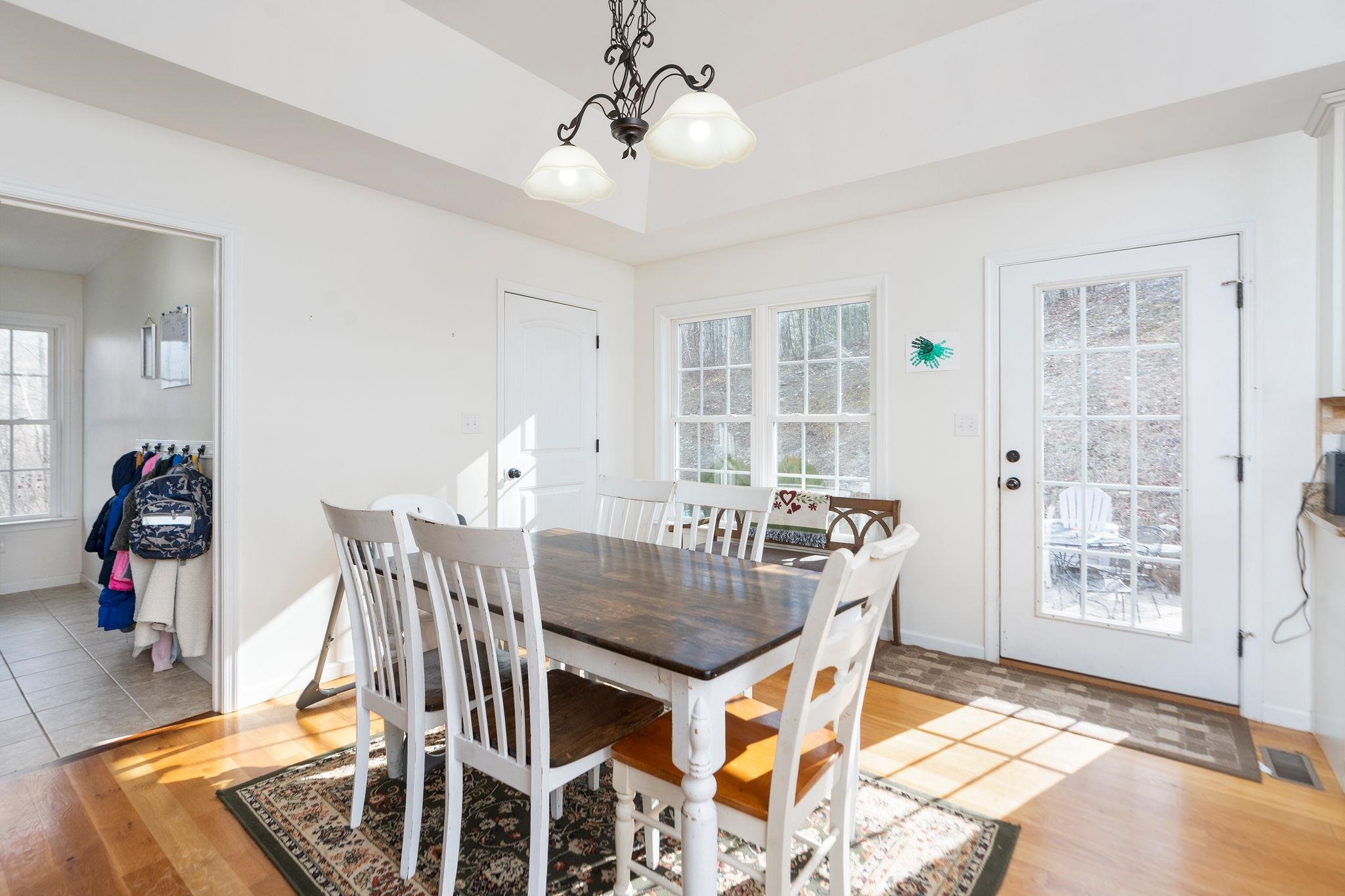 467 Reeds Gap Road Lyndhurst, VA 22952 - Photo 11 of 42 a view of a dining room with furniture and wooden floor