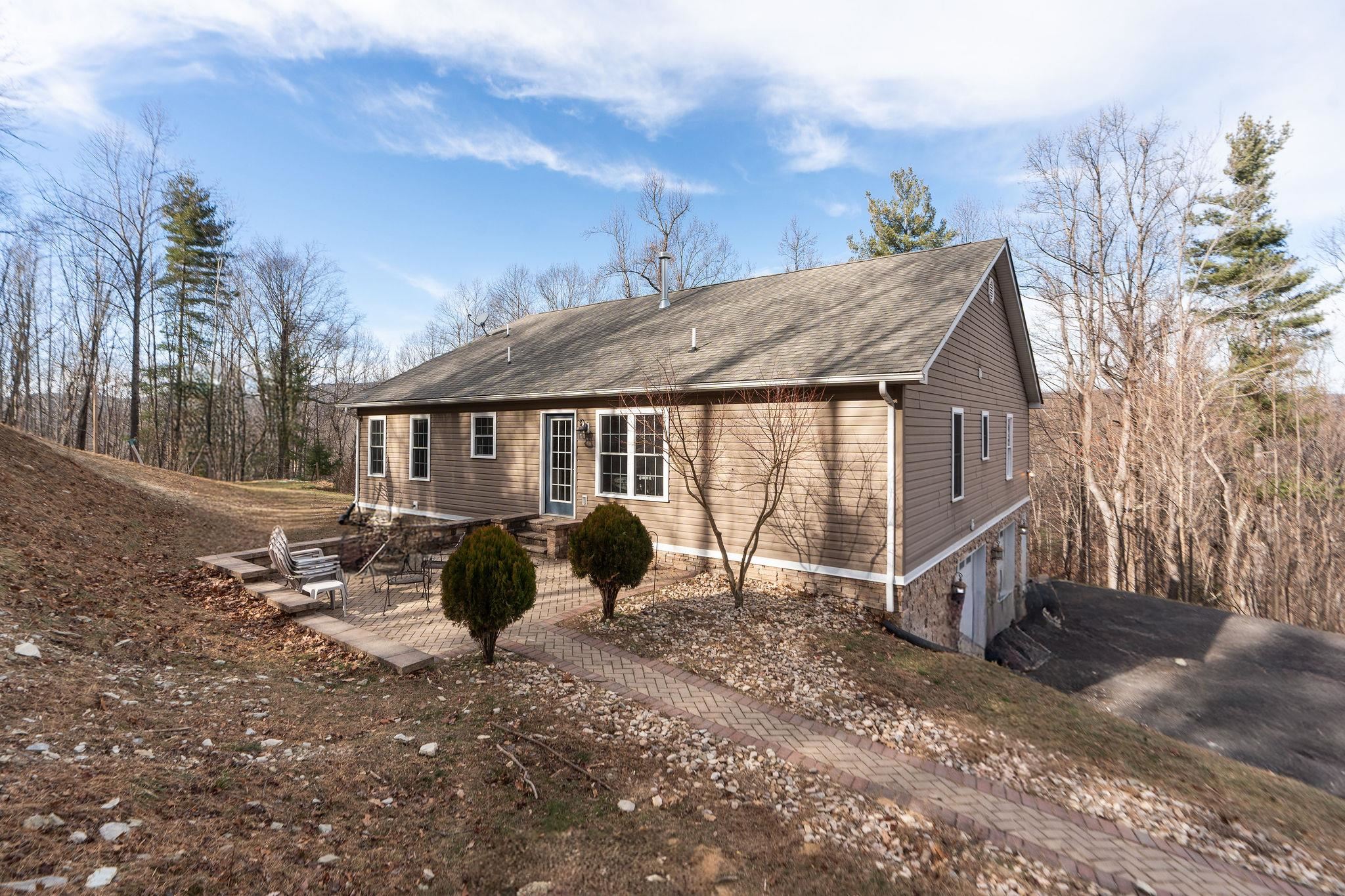 467 Reeds Gap Road Lyndhurst, VA 22952 - Photo 33 of 42 a backyard of a house with table and chairs