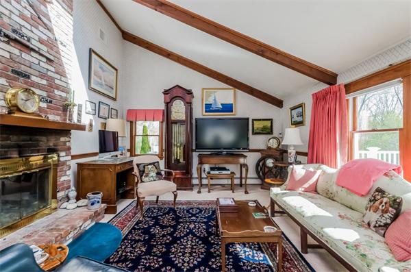 21 Schooner Ridge Marblehead, MA 01945 - Photo 13 of 30 a living room with furniture and a flat screen tv