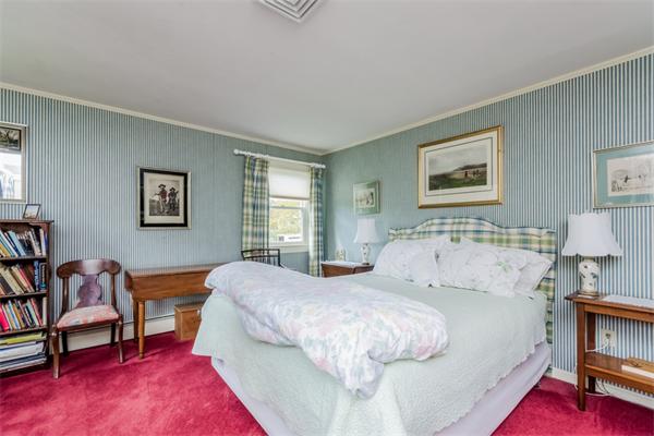 21 Schooner Ridge Marblehead, MA 01945 - Photo 18 of 30 a spacious bedroom with a bed and a couch