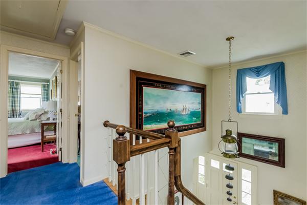 21 Schooner Ridge Marblehead, MA 01945 - Photo 22 of 30 a living room with furniture and a flat screen tv