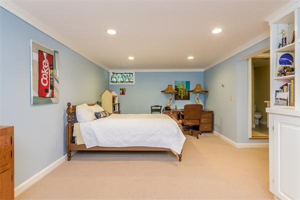 21 Schooner Ridge Marblehead, MA 01945 - Photo 23 of 30 a bedroom with a bed and wooden floor