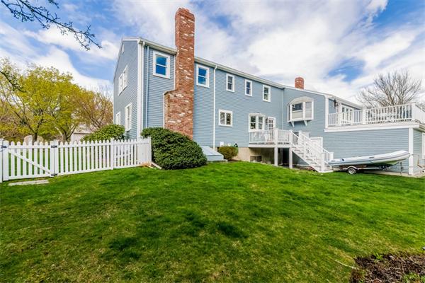 21 Schooner Ridge Marblehead, MA 01945 - Photo 24 of 30 a front view of a house with garden