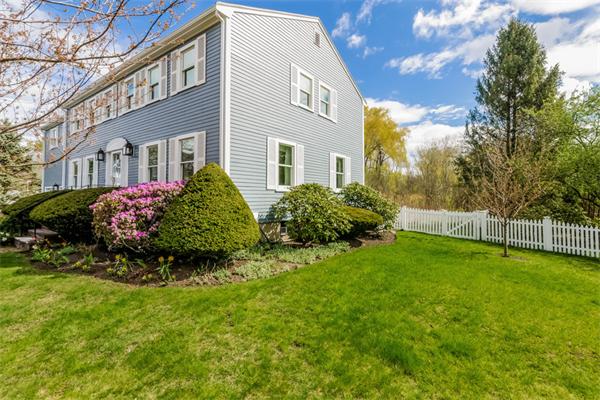 21 Schooner Ridge Marblehead, MA 01945 - Photo 25 of 30 a front view of a house with a garden