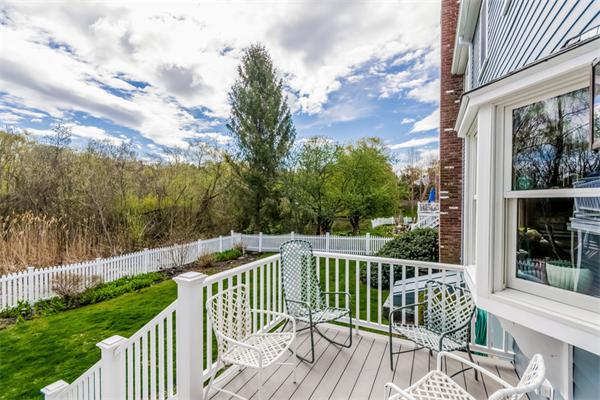 21 Schooner Ridge Marblehead, MA 01945 - Photo 27 of 30 a view of a wooden deck with a yard