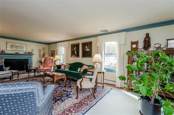 21 Schooner Ridge Marblehead, MA 01945 - Photo 3 of 30 a living room with furniture a window and a fireplace
