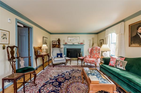 21 Schooner Ridge Marblehead, MA 01945 - Photo 4 of 30 a living room with furniture a rug and a fireplace