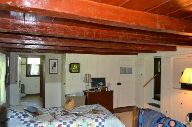 460 Gower Road Nazareth, PA 18064 - Photo 21 of 37 a bedroom with a bed and wooden floor