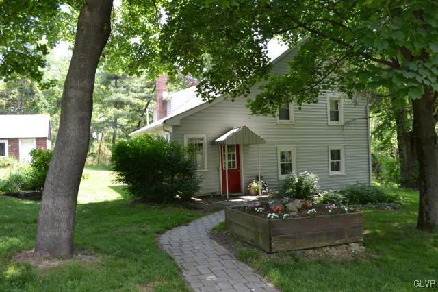 460 Gower Road Nazareth, PA 18064 - Photo 3 of 37 a front view of a house with garden