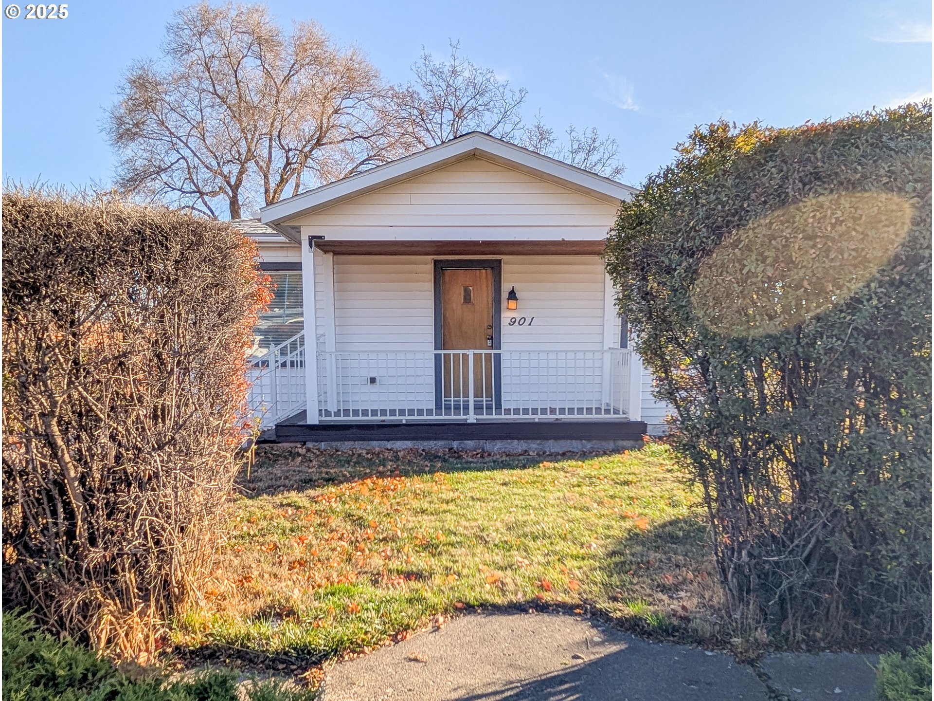 901 2nd Street La Grande, OR 97850 - Photo 12 of 19 a front view of a house with a yard