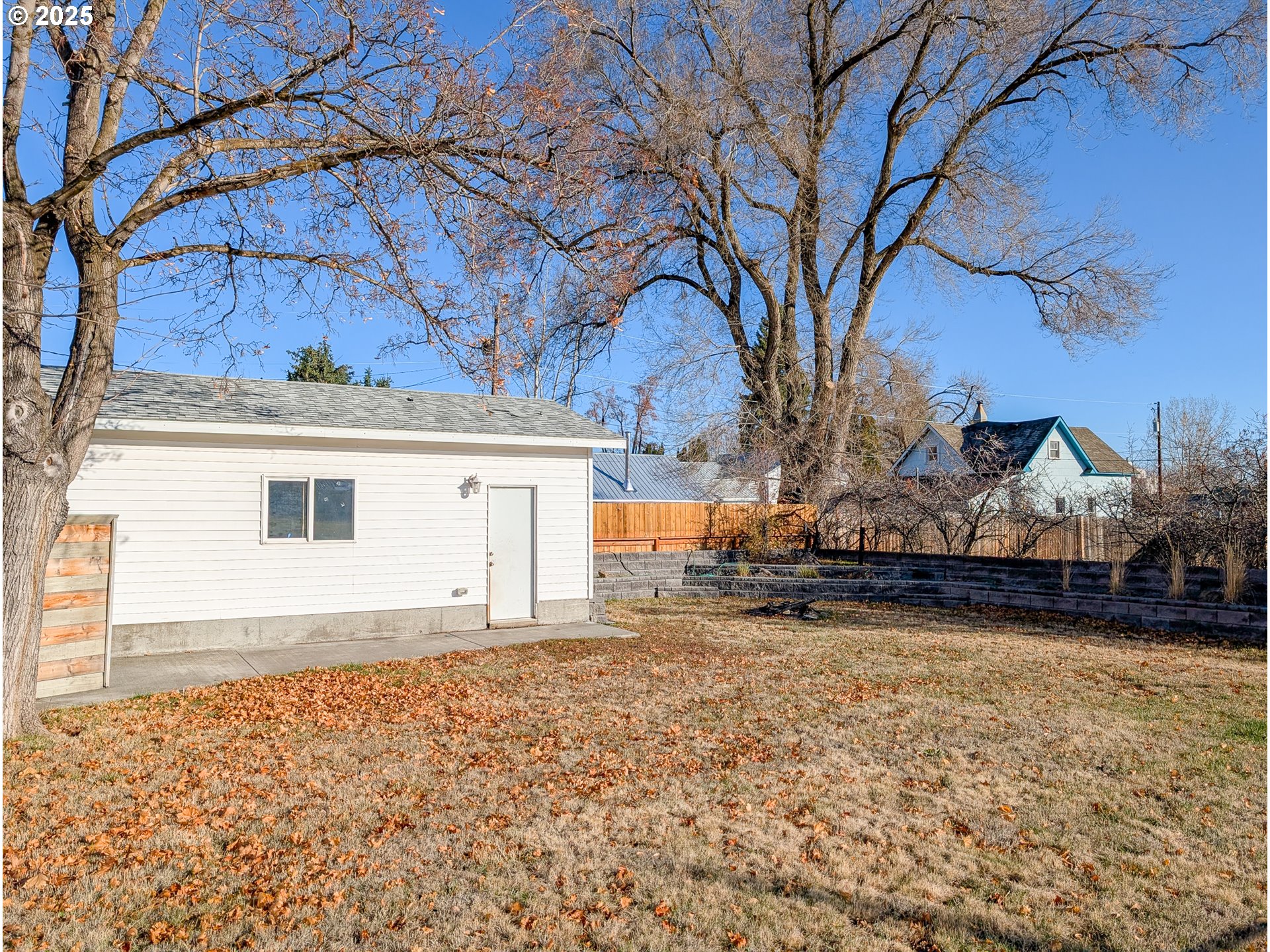 901 2nd Street La Grande, OR 97850 - Photo 14 of 19 a view of a house with a snow in the yard