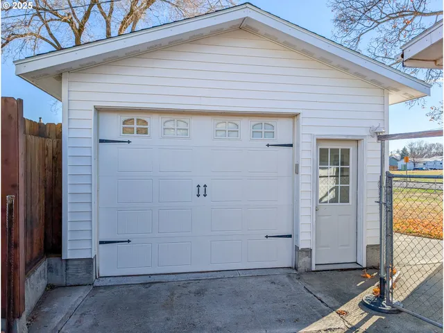 a front view of a house with parking