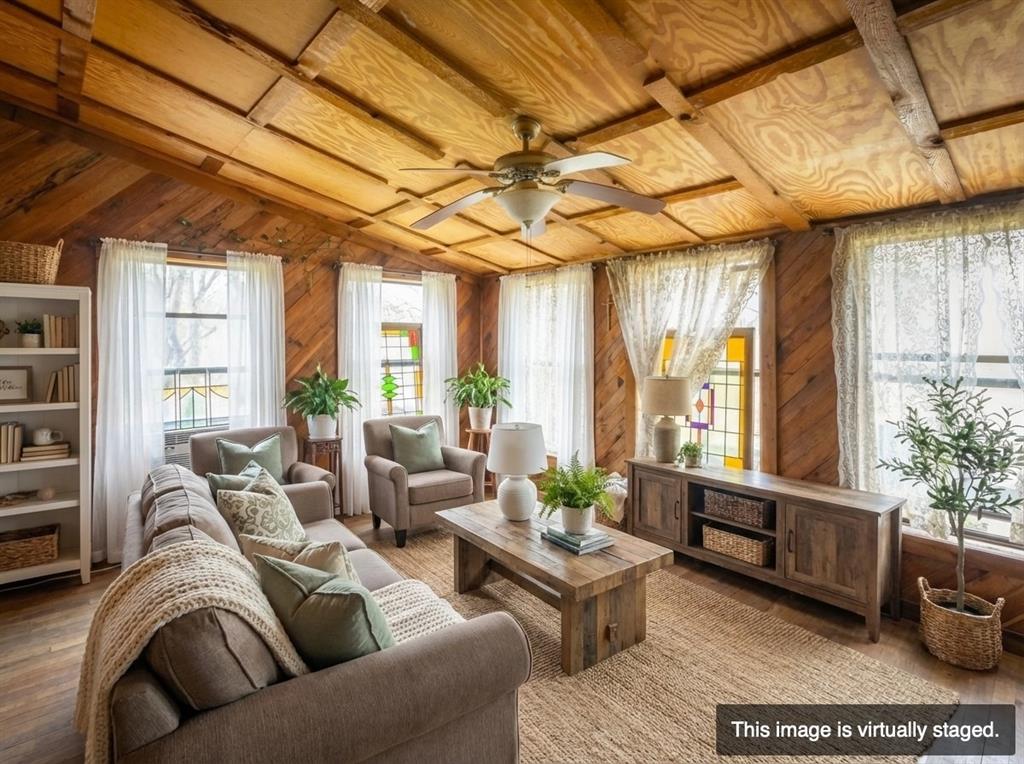 250 Mail Rte Road Fischer, TX 78623 - Photo 14 of 29 a living room with furniture and a potted plant