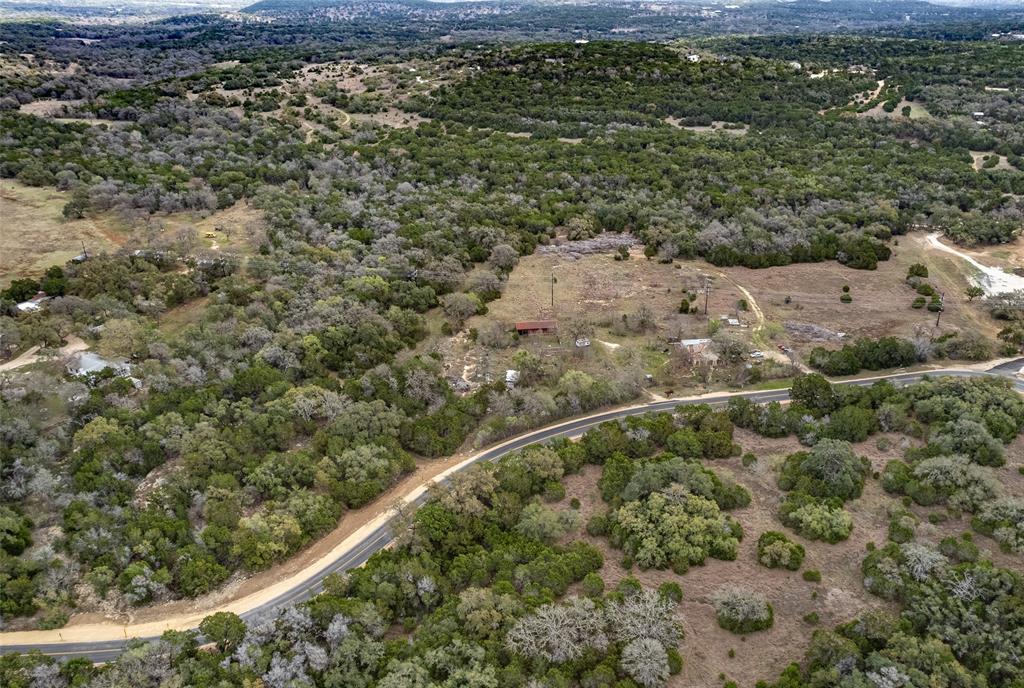 250 Mail Rte Road Fischer, TX 78623 - Photo 24 of 29 a view of a houses with a yard