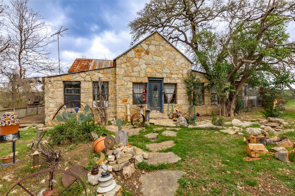 250 Mail Rte Road Fischer, TX 78623 - Photo 4 of 29 a front view of house with yard outdoor seating and green space