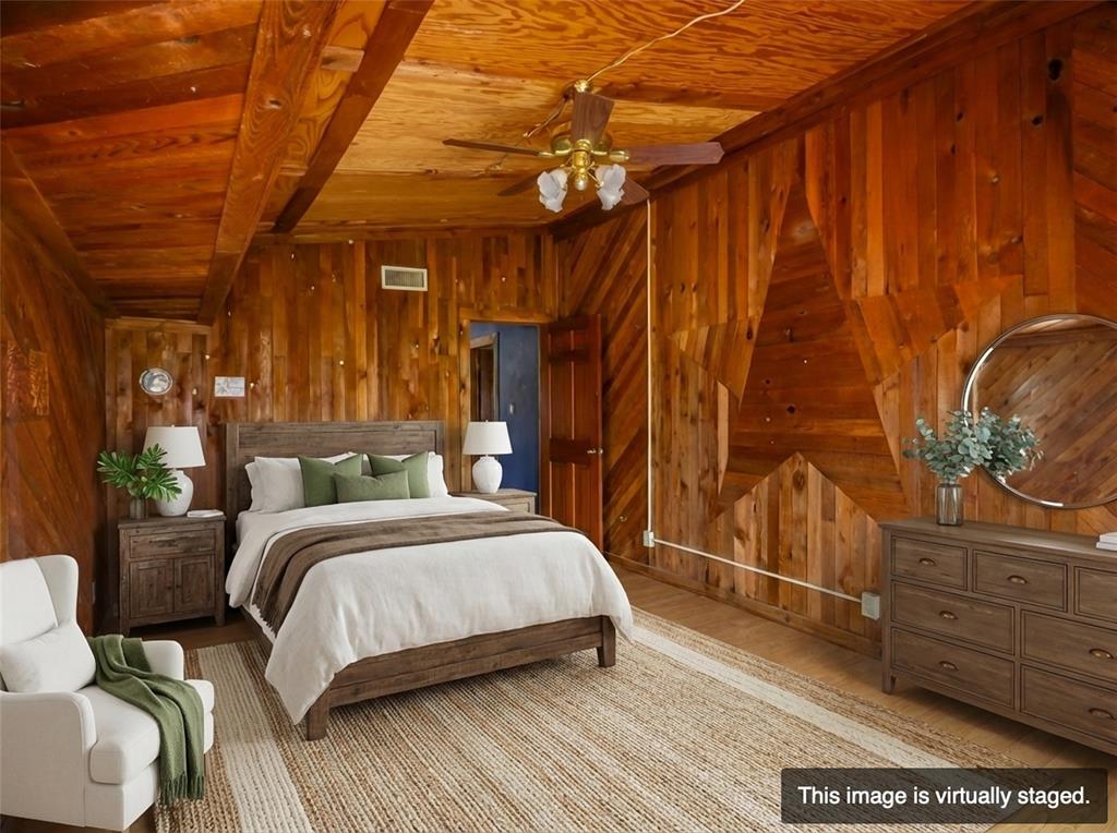 250 Mail Rte Road Fischer, TX 78623 - Photo 6 of 29 a bedroom with a bed and a dresser