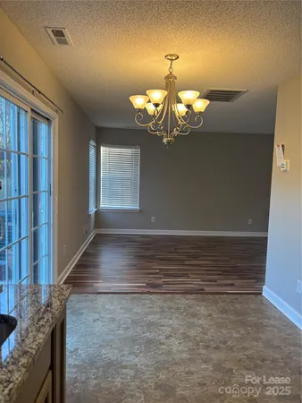 a view of a livingroom with a chandelier