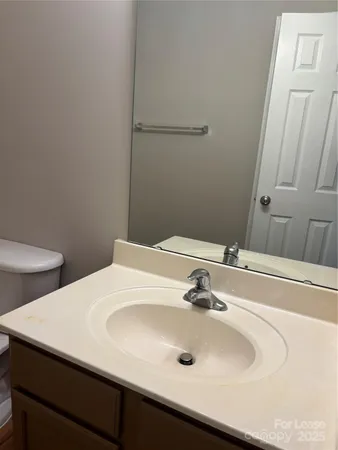 a bathroom with a sink and a toilet