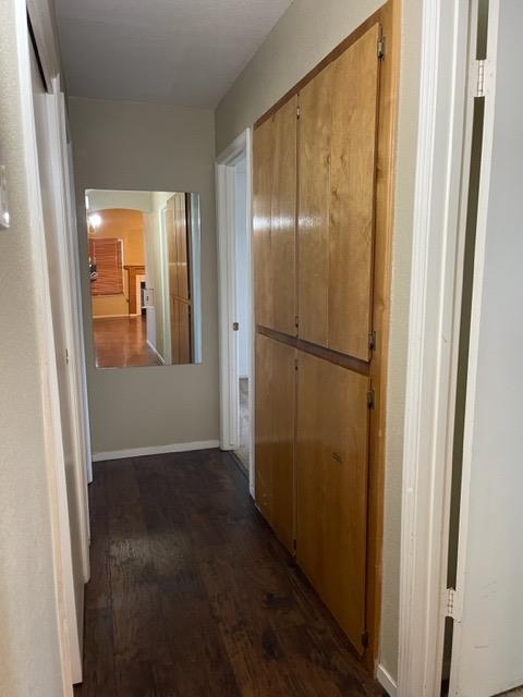 1240 Seneca Drive Madera, CA 93637 - Photo 16 of 21 a view of a hallway with wooden floor