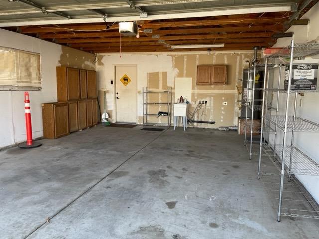 1240 Seneca Drive Madera, CA 93637 - Photo 17 of 21 a view of empty room with wooden walls